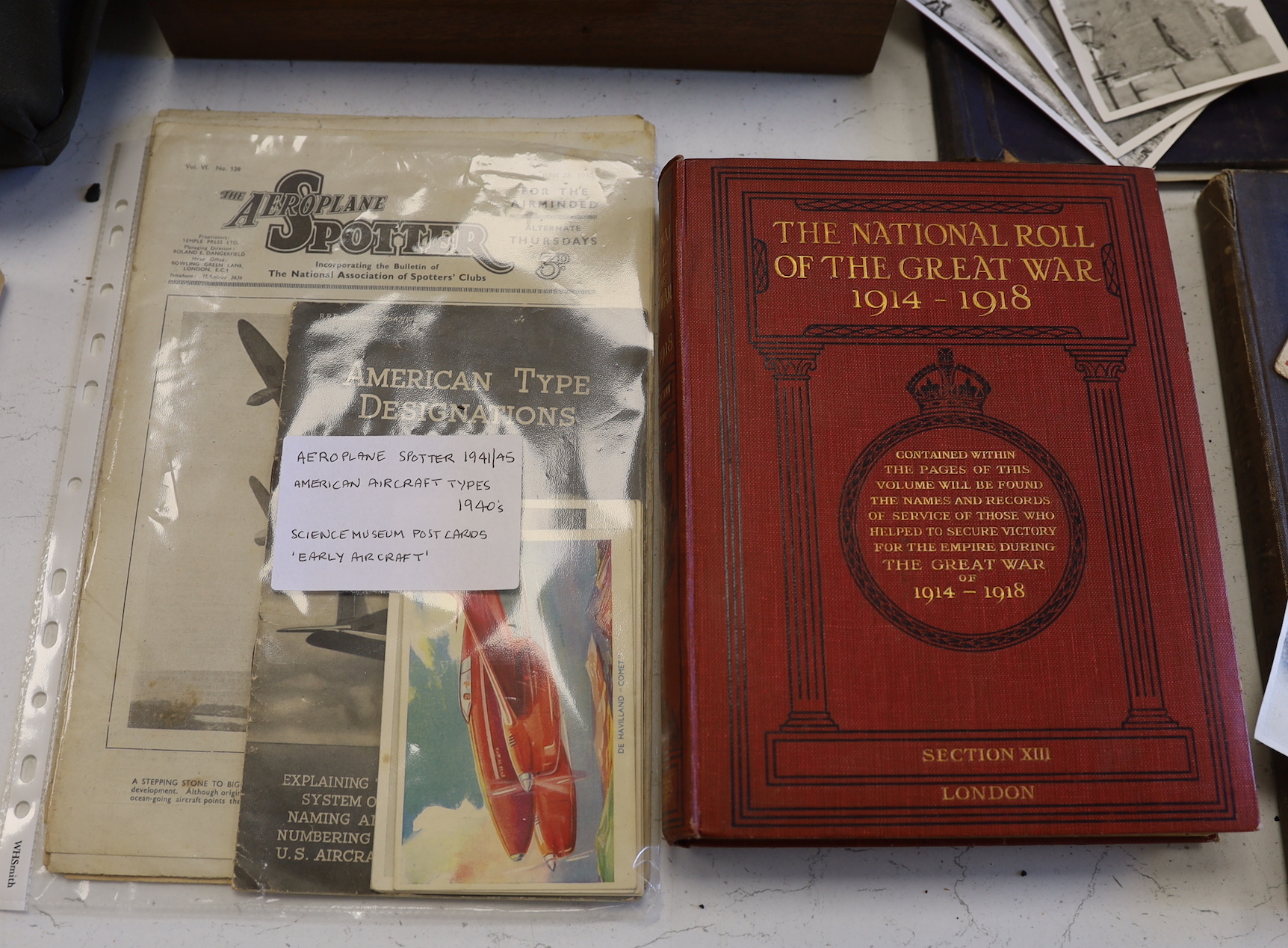 A quantity of war memorabilia including gas masks, postcards etc